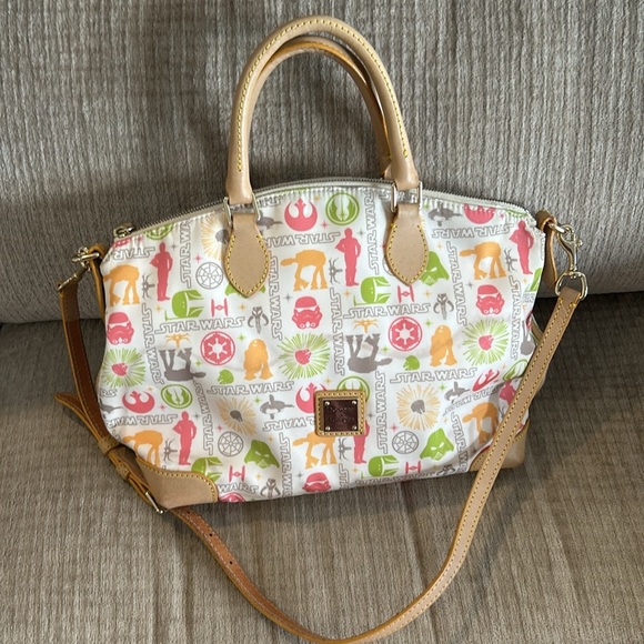 Dooney and Bourke disney’s Star Wars on the light side bag Crossbody
10 x 14 x 6 - Picture 8 of 11